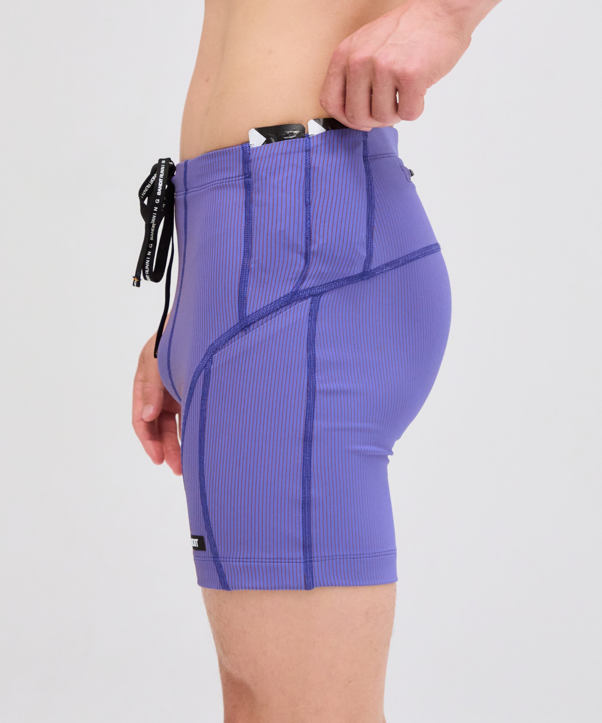 Bandit | Striped Cadence™ 7 Pocket Quarter Tights - Deep Peri Blue with Rust