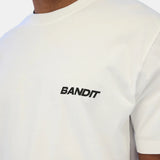 Bandit | เสื้อยืด The Community ยูนิเซ็กซ์ - สีช็อกโกแลตกับสีฟ้าสโมกี้ 